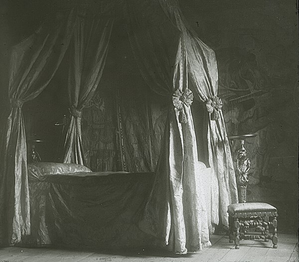 Antique four poster canopy bed.