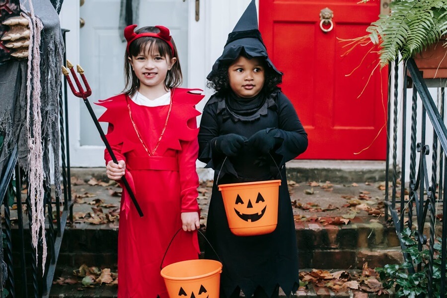 Children dressed for trick or treat for Halloween